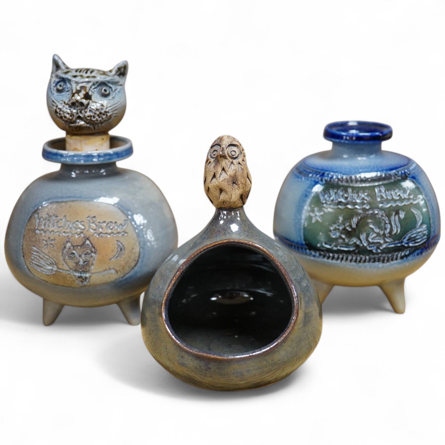 Guy Sydenham (1916-2005), two ‘witches brew jars’, one with ‘cats head’ stopper and a salt cellar, tallest 14cm